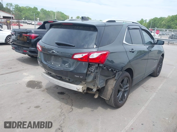 2021 Chevrolet Equinox LT with VIN 3GNAXUEVXML341465, listed as a IAAI auction lot 42027654 with 126,932 mi miles and . Bid and sale history available at DreamBid. Image 4.