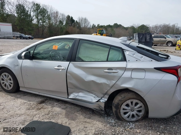 2021 Toyota Prius L Eco with VIN JTDKAMFU1M3152848, listed as a IAAI auction lot 41600212 with 140,114 mi miles. Bid and sale history available at carsss.com. Image 6.