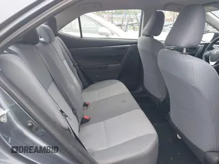 2014 Toyota Corolla L with VIN 2T1BURHE5EC027497, listed as a IAAI auction lot 42602880 with 101,094 mi miles and . Bid and sale history available at DreamBid. Image 8.