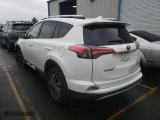 2016 Toyota RAV4 Hybrid XLE with VIN JTMRJREV7GD051091, listed as a Copart auction lot 73675162 with 168,832 mi miles. Bid and sale history available at carsss.com. Image 2.