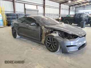 2021 Tesla Model S Long Range with VIN 5YJSA1E51MF429302, listed as a Copart auction lot 58242465 with 148,472 mi miles and Salvage title. Bid and sale history available at DreamBid. Image 4.