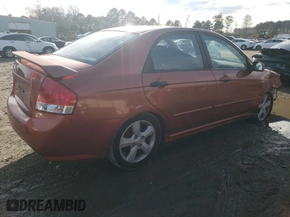 2009 Kia Spectra SX with VIN KNAFE221X95026213, listed as a Copart auction lot 85348104 with 124,171 mi miles and Salvage Title. Bid and sale history available at carsss.com. Image 3.