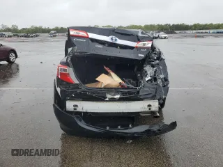 2012 Toyota Camry XLE z VIN 4T1BD1FK8CU001921, wystawiony jako Copart lot #57861715 z przebiegiem Nie podano mil oraz Szkoda całkowita • Salvage title. Historia ofert i sprzedaży dostępna na DreamBid. Obrazek 6.