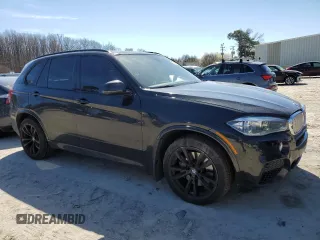 2014 BMW X5 xDrive50i with VIN 5UXKR6C51E0J73170, listed as a Copart auction lot 49260175 with 129,625 mi miles and Salvage Title. Bid and sale history available at carsss.com. Image 4.