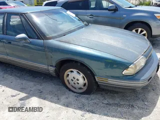1992 Oldsmobile 88 z VIN 1G3HY53L3N1828043, wystawiony jako IAAI lot #42454589 z przebiegiem 120 462 mil mil oraz . Historia ofert i sprzedaży dostępna na DreamBid. Obrazek 1.