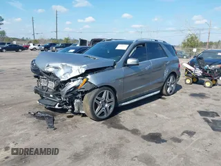 2013 Mercedes-Benz M ML 63 AMG with VIN 4JGDA7EB9DA155725, listed as a IAAI auction lot 41502675 with 64,849 mi miles. Bid and sale history available at carsss.com. Image 2.