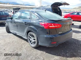 2016 Ford Focus SE with VIN 1FADP3F29GL209601, listed as a IAAI auction lot 41744560 with 68,058 mi miles. Bid and sale history available at carsss.com. Image 3.