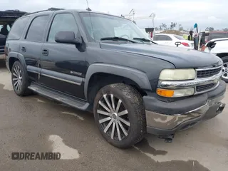 2003 Chevrolet Tahoe LS with VIN 1GNEC13T73R297770, listed as a IAAI auction lot 42071895 with 215,848 mi miles. Bid and sale history available at carsss.com. Image 1.