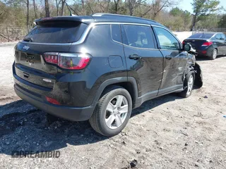 2022 Jeep Compass Latitude with VIN 3C4NJCBB4NT140193, listed as a IAAI auction lot 41787187 with 69,155 mi miles and . Bid and sale history available at carsss.com. Image 4.