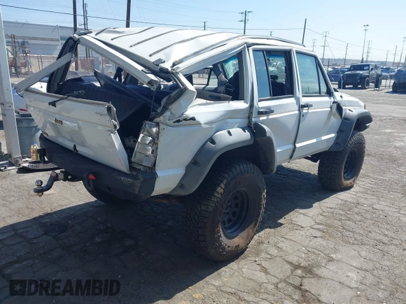 1991 Jeep Cherokee Country z VIN 1J4FJ78S7ML632675, wystawiony jako IAAI lot #42283175 z przebiegiem 116 062 mil mil oraz . Historia ofert i sprzedaży dostępna na DreamBid. Obrazek 4.