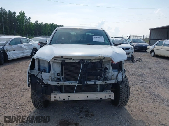 2017 Toyota Tacoma SR5 with VIN 3TMCZ5AN1HM063580, listed as a IAAI auction lot 42421660 with 95,543 mi miles and . Bid and sale history available at DreamBid. Image 13.