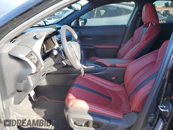 2021 Lexus UX with VIN JTHE9JBH0M2036963, listed as a Copart auction lot 82687744 with 24,857 mi miles and Salvage Title. Bid and sale history available at carsss.com. Image 7.
