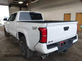 2025 Toyota Tacoma SR with VIN 3TMLB5JN2SM090394, listed as a IAAI auction lot 41916312 with 840 mi miles and . Bid and sale history available at DreamBid. Image 3.