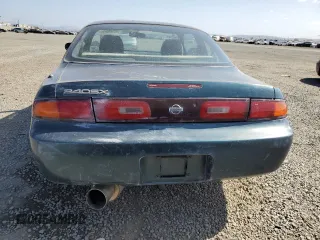 1995 Nissan 240SX z VIN JN1AS44D1SW014527, wystawiony jako Copart lot #54392065 z przebiegiem 197 136 mil mil oraz Tytuł czysty. Historia ofert i sprzedaży dostępna na DreamBid. Obrazek 6.