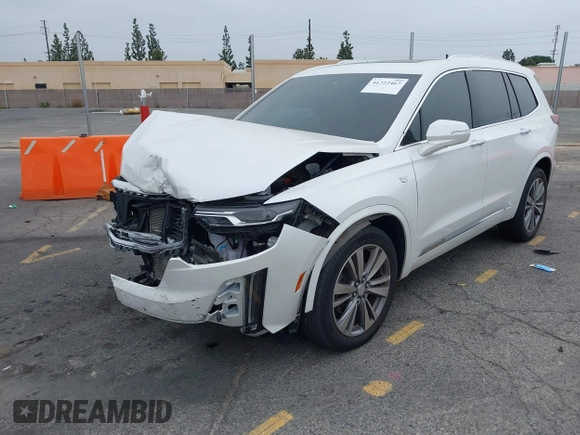 2020 Cadillac XT6 AWD Premium Luxury with VIN 1GYKPDRS3LZ197322, listed as a IAAI auction lot 41722467 with 58,128 mi miles and . Bid and sale history available at DreamBid. Image 2.