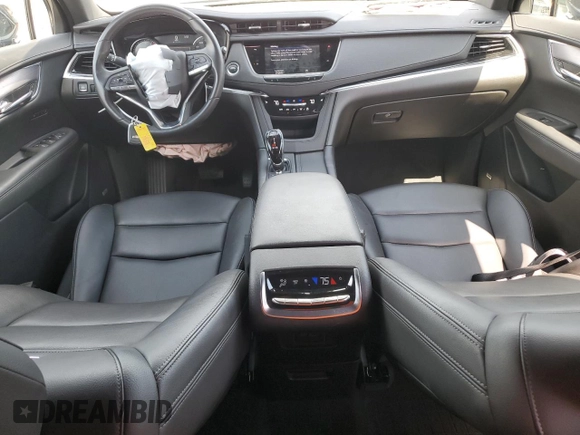 2023 Cadillac XT6 FWD Luxury z VIN 1GYKPAR45PZ187400, wystawiony jako Copart lot #54562335 z przebiegiem 16 953 mil mil oraz Szkoda całkowita • Salvage title. Historia ofert i sprzedaży dostępna na DreamBid. Obrazek 8.