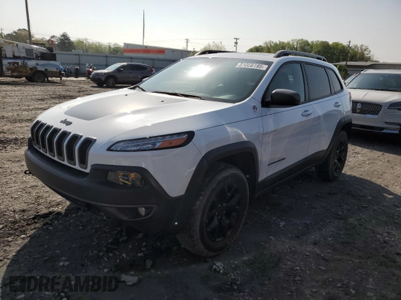 2015 Jeep Cherokee Trailhawk z VIN 1C4PJMBS6FW558653, wystawiony jako Copart lot #51066195 z przebiegiem 32 905 mil mil oraz Szkoda całkowita • Salvage title. Historia ofert i sprzedaży dostępna na DreamBid. Obrazek 1.