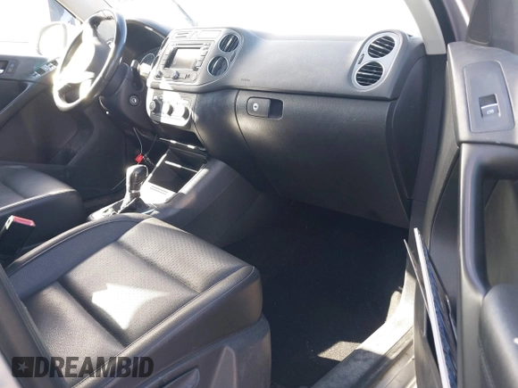 2011 Volkswagen Tiguan SE with VIN WVGBV7AX4BW561845, listed as a IAAI auction lot 41840195 with 171,929 mi miles and . Bid and sale history available at DreamBid. Image 5.