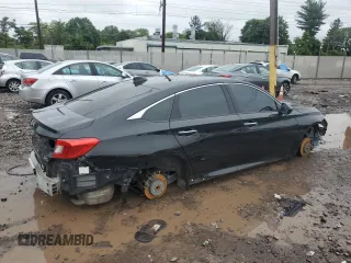 2018 Honda Accord Touring z VIN 1HGCV2F95JA029717, wystawiony jako Copart lot #56161585 z przebiegiem 128 576 mil mil oraz Szkoda całkowita • Salvage title. Historia ofert i sprzedaży dostępna na DreamBid. Obrazek 3.