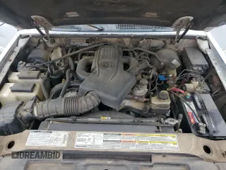 2001 Ford Explorer Sport Trac with VIN 1FMZU67E51UA46266, listed as a Copart auction lot 56628755 with 210,524 mi miles and Salvage title. Bid and sale history available at DreamBid. Image 11.
