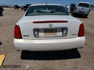 2005 Cadillac DeVille DHS with VIN 1G6KE57YX5U180240, listed as a Copart auction lot 59860054 with 0 mi miles and Salvage Title. Bid and sale history available at carsss.com. Image 6.