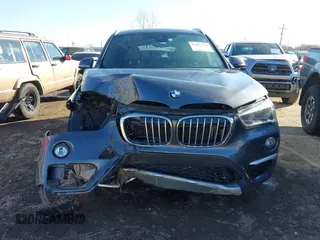 2017 BMW X1 sDrive28i with VIN WBXHU7C30H5H32753, listed as a IAAI auction lot 41441791 with 100,072 mi miles. Bid and sale history available at carsss.com. Image 13.