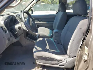 2004 Nissan Frontier XE with VIN 1N6DD26T54C472795, listed as a Copart auction lot 57382115 with 200,903 mi miles and Salvage title. Bid and sale history available at DreamBid. Image 7.