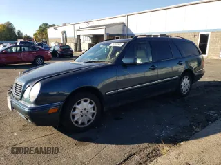 1999 Mercedes-Benz E-Class with VIN WDBJH82F4XX026758, listed as a Copart auction lot 76740804 with 136,782 mi miles and Salvage Title. Bid and sale history available at carsss.com. Image 1.