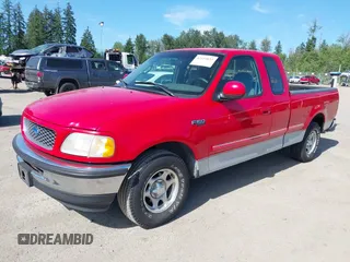 1997 Ford F-150 with VIN 2FTEX17L9VCA27687, listed as a IAAI auction lot 42454035 with 122,179 mi miles and . Bid and sale history available at DreamBid. Image 2.