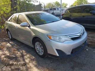 2013 Toyota Camry L with VIN 4T4BF1FK9DR317734, listed as a IAAI auction lot 42060073 with 202,480 mi miles. Bid and sale history available at carsss.com. Image 1.