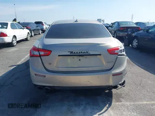 2014 Maserati Ghibli S Q4 z VIN ZAM57RTA8E1095303, wystawiony jako IAAI lot #41600587 z przebiegiem 98 215 mil mil oraz . Historia ofert i sprzedaży dostępna na DreamBid. Obrazek 16.