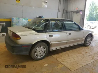 1995 Saturn SL with VIN 1G8ZH5280SZ302560, listed as a Copart auction lot 63290495 with 123,475 mi miles and Clean title. Bid and sale history available at DreamBid. Image 3.