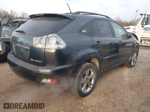2007 Lexus RX 400h z VIN JTJGW31U372002594, wystawiony jako IAAI lot #41380924 z przebiegiem 243 928 mil mil oraz . Historia ofert i sprzedaży dostępna na DreamBid. Obrazek 4.