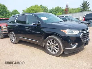 2019 Chevrolet Traverse Premier z VIN 1GNEVKKW1KJ282531, wystawiony jako IAAI lot #42408361 z przebiegiem 95 464 mil mil oraz . Historia ofert i sprzedaży dostępna na DreamBid. Obrazek 1.