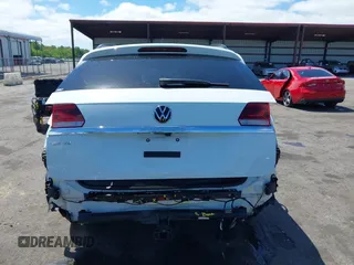 2021 Volkswagen Atlas SE z VIN 1V2WR2CA2MC529355, wystawiony jako IAAI lot #41972048 z przebiegiem 63 970 mil mil oraz . Historia ofert i sprzedaży dostępna na DreamBid. Obrazek 16.