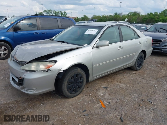 2004 Toyota Camry LE with VIN 4T1BE32K84U374943, listed as a IAAI auction lot 42038382 with 323,419 mi miles. Bid and sale history available at carsss.com. Image 2.