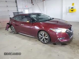 2016 Nissan Maxima Platinum с VIN 1N4AA6AP1GC405024, выставлен на аукционе Copart как лот 56523215 с пробегом 98 292 миль миль и Списание • Salvage title. История ставок и продаж доступна на DreamBid. Изображение 4.