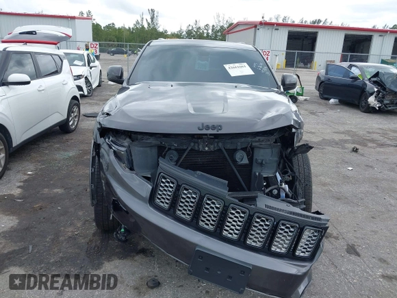 2018 Jeep Grand Cherokee Altitude z VIN 1C4RJEAG2JC428214, wystawiony jako IAAI lot #42661661 z przebiegiem 81 859 mil mil oraz . Historia ofert i sprzedaży dostępna na DreamBid. Obrazek 13.