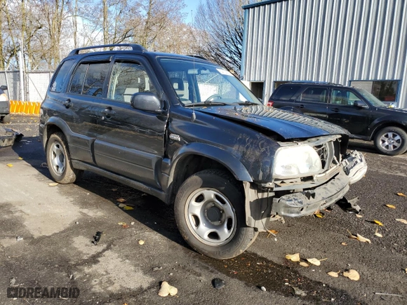 2002 Suzuki Grand Vitara JLX with VIN JS3TD62V324154082, listed as a Copart auction lot 84174574 with 236,372 mi miles and Salvage Title. Bid and sale history available at carsss.com. Image 4.