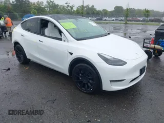 2022 Tesla Model Y Long Range z VIN 7SAYGDEE3NF524295, wystawiony jako IAAI lot #42340353 z przebiegiem 29 853 mil mil oraz . Historia ofert i sprzedaży dostępna na DreamBid. Obrazek 1.