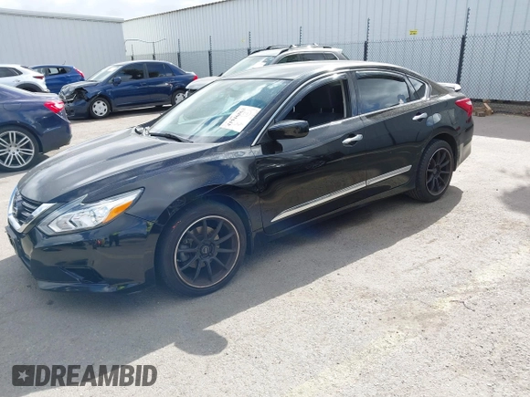 2016 Nissan Altima SR with VIN 1N4AL3AP2GC142213, listed as a IAAI auction lot 41946863 with 100,858 mi miles and . Bid and sale history available at carsss.com. Image 17.