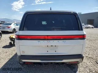 2023 Rivian R1S Launch Edition with VIN 7PDSGABLXPN004161, listed as a Copart auction lot 67390954 with 0 mi miles and Salvage Title. Bid and sale history available at carsss.com. Image 6.