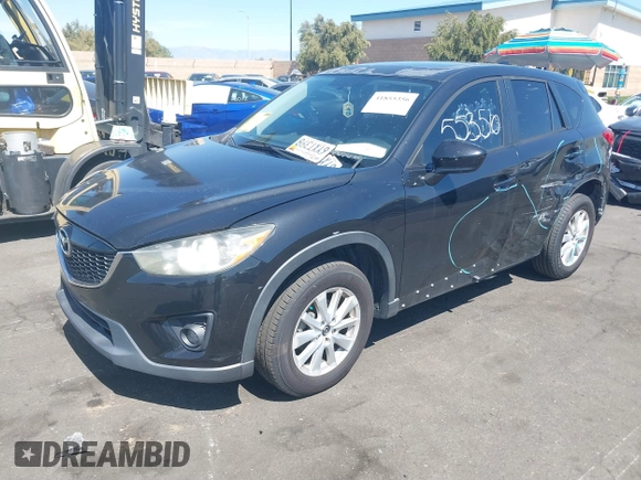 2013 Mazda CX-5 Touring with VIN JM3KE2CEXD0153589, listed as a IAAI auction lot 41855356 with 86,030 mi miles and . Bid and sale history available at DreamBid. Image 17.