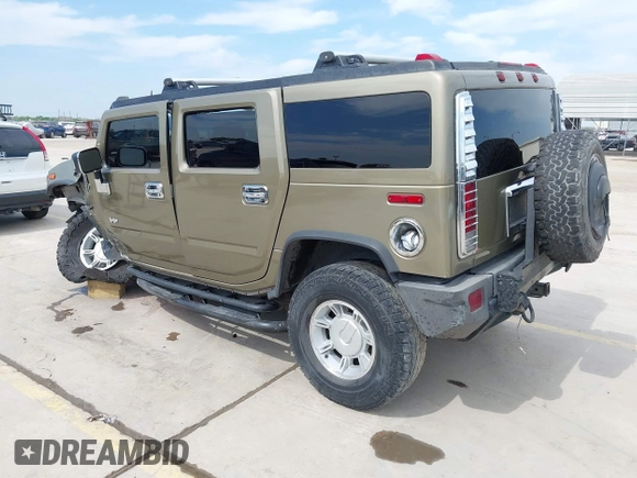 2006 Hummer H2 with VIN 5GRGN23U56H102574, listed as a IAAI auction lot 41955539 with 202,102 mi miles. Bid and sale history available at carsss.com. Image 3.