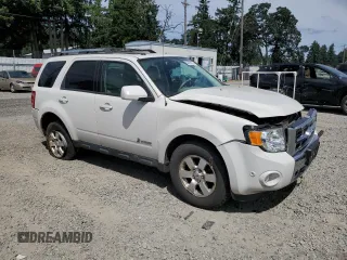 2012 Ford Escape Hybrid with VIN 1FMCU5K37CKA44510, listed as a Copart auction lot 63316175 with 156,892 mi miles and Salvage title. Bid and sale history available at DreamBid. Image 4.