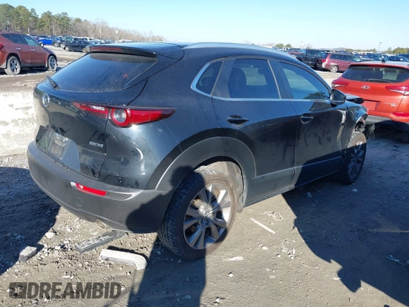 2023 Mazda CX-30 2.5 S Preferred Package with VIN 3MVDMBCM9PM519070, listed as a IAAI auction lot 41351129 with 76,711 mi miles. Bid and sale history available at carsss.com. Image 4.
