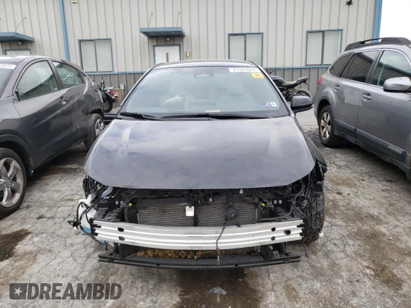 2023 Toyota Corolla Hatchback XSE with VIN JTNC4MBE8P3202316, listed as a Copart auction lot 71161024 with 32,487 mi miles and Salvage Title. Bid and sale history available at carsss.com. Image 5.