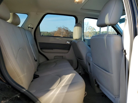 2009 Mercury Mariner Premier with VIN 4M2CU87719KJ20162, listed as a Copart auction lot 84315594 with 143,548 mi miles and Salvage Title. Bid and sale history available at carsss.com. Image 11.