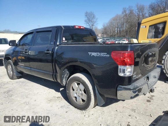 2012 Toyota Tundra 4WD Truck with VIN 5TFDY5F10CX221679, listed as a Copart auction lot 86716234 with 209,394 mi miles and Clean Title. Bid and sale history available at carsss.com. Image 2.