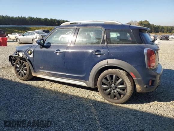 2018 MINI Countryman Cooper S E with VIN WMZYU7C47J3E56451, listed as a Copart auction lot 77193144 with 60,949 mi miles and Salvage Title. Bid and sale history available at carsss.com. Image 2.